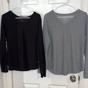 2 polyester/spandex long sleeved shirts